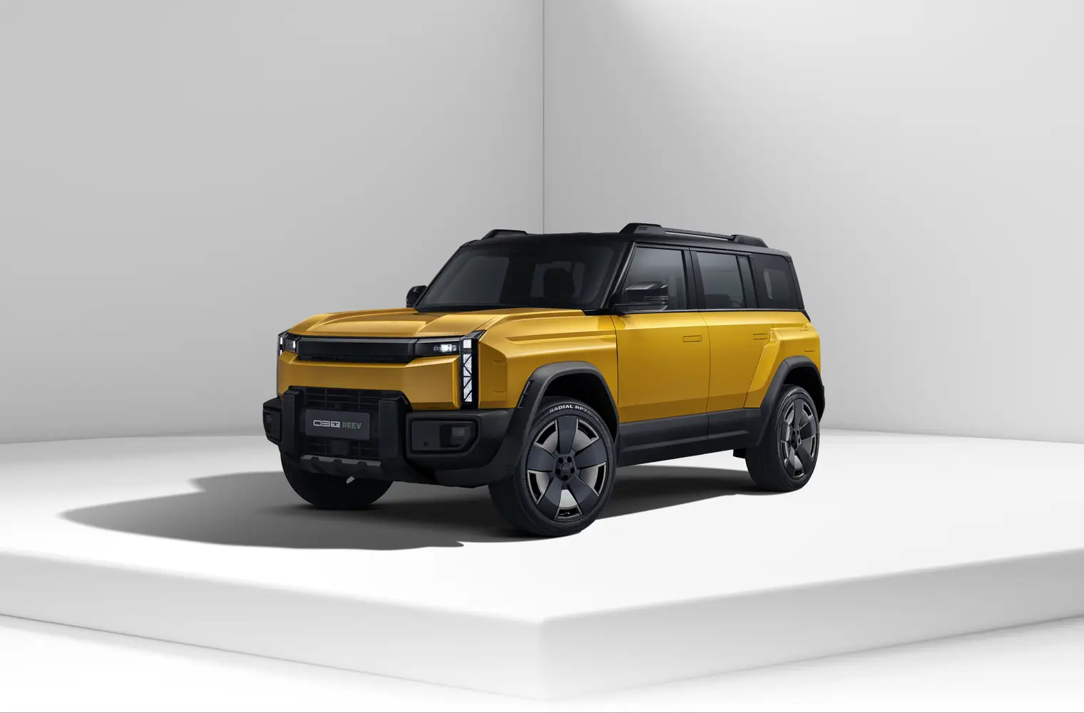 Golden Yellow 03T REEV front three-quarter view