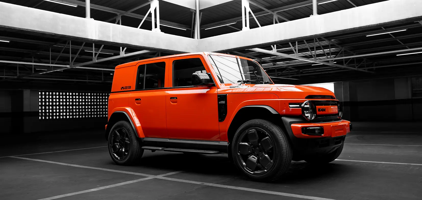 iCAUR V23 exterior side profile in a parking structure