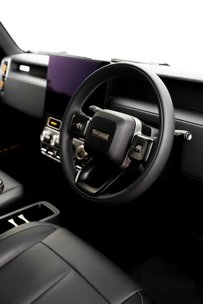 Plush leather seating and steering wheel in the V23 interior