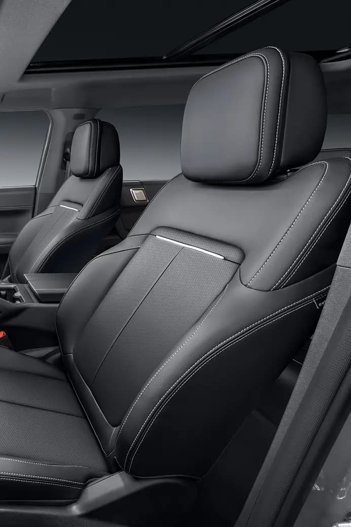 Plush leather seating and steering wheel in the V23 interior